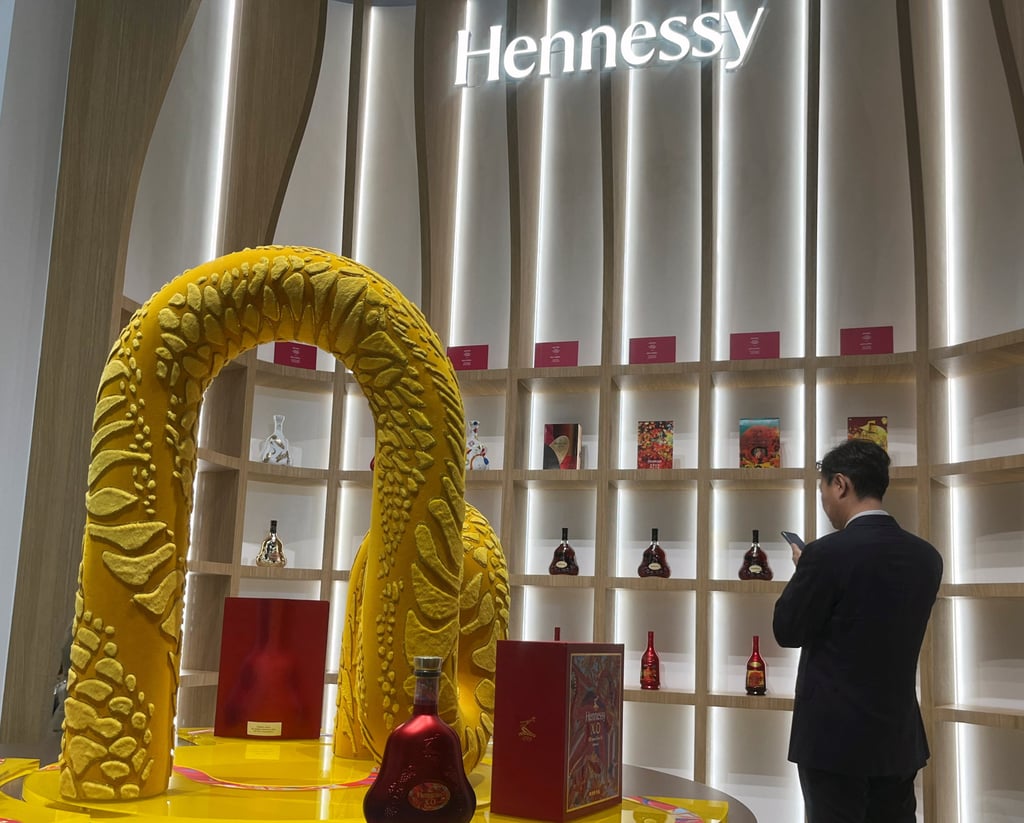 A man stands at the Hennessy booth at the China International Import Expo in Shanghai, China on November 7. Photo: Reuters