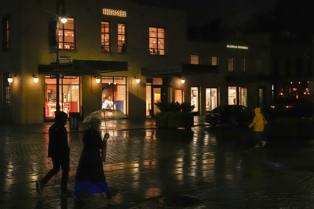 People walk past a Hermès store in the Meatpacking District. The neighbourhood is known more for its high-end boutiques and expensive restaurants than the industry that gave it its name. Photo: AP