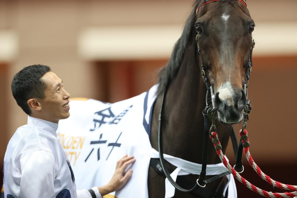 Jockey Vincent Ho shares a moment with his long-time steed at the Farewell to Golden Sixty retirement ceremony. Photo: The Hong Kong Jockey Club