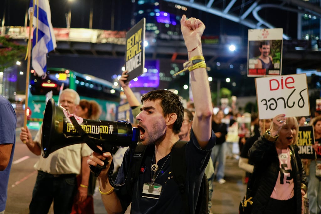Demonstrators in Tel Aviv protest against the Israeli government’s management of the conflict in Gaza. Photo: Reuters