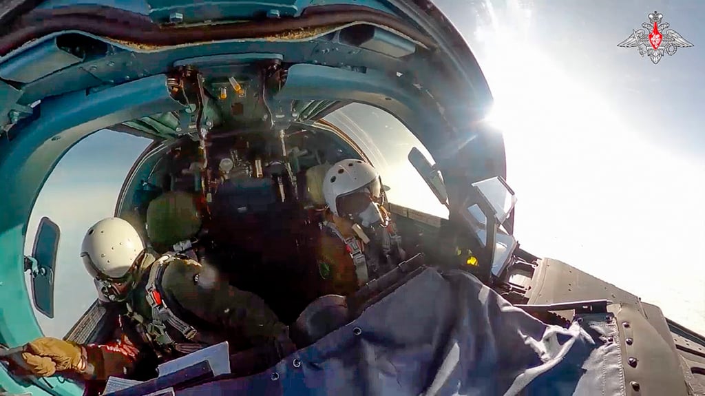 Pilots of a Russian Su-34 bomber fly at an undisclosed location in Ukraine. The photo was taken from video released on Thursday. Photo: Russian Defence Ministry via AP Pilots of a Russian Su-34 bomber fly at an undisclosed location in Ukraine. The photo was taken from video released on Thursday. Photo: Russian Defence Ministry via AP