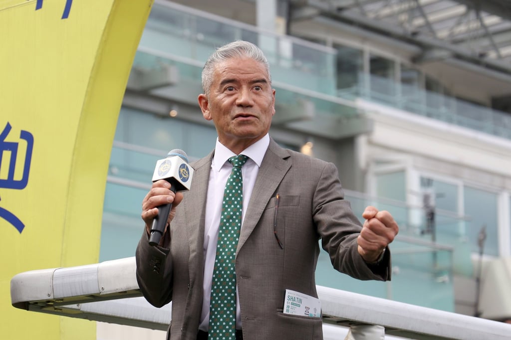 Tony Cruz speaks at Sha Tin Racecourse after his 1,500th win as a trainer in April 2024. Photo: The Hong Kong Jockey Club