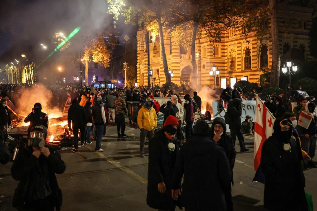 Protesters clash with police during a demonstration outside Georgia’s parliament in Tbilisi. Photo: AFP Protesters clash with police during a demonstration outside Georgia’s parliament in Tbilisi. Photo: AFP