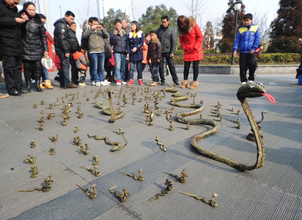 Snakes made of palm leaves are displayed in Shanghai to celebrate the previous Year of the Snake in 2013. Photo: Getty Images