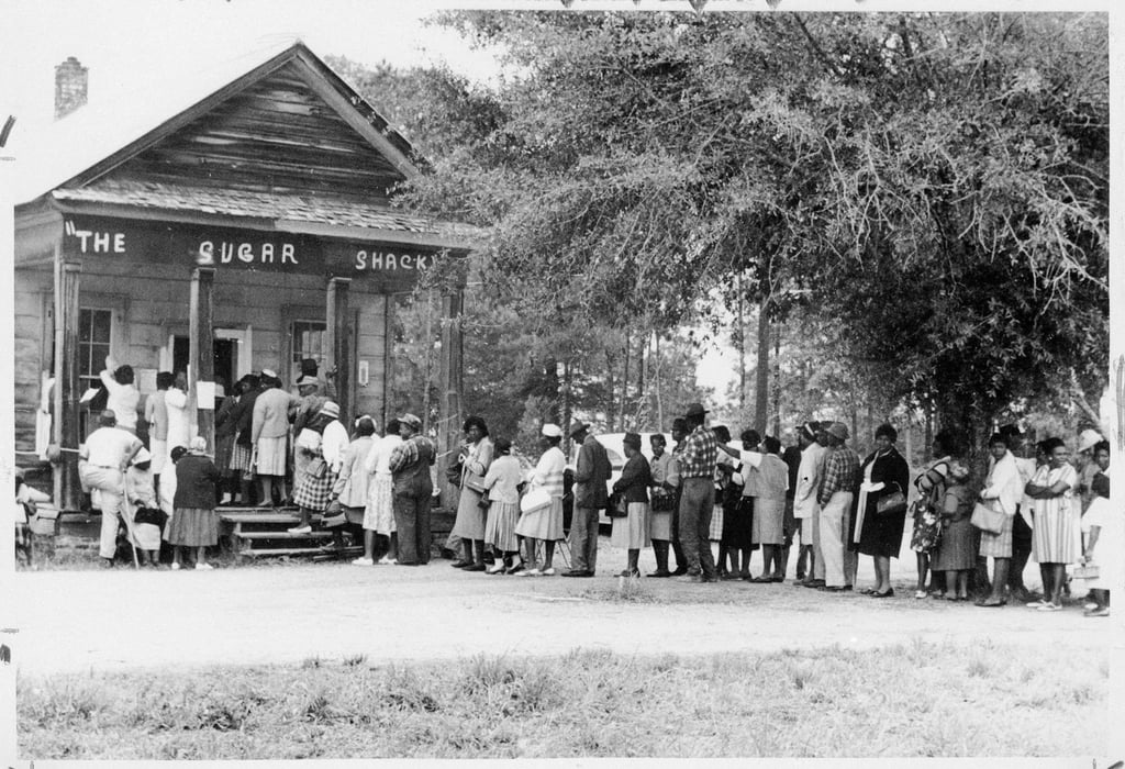 Following the passage of the Voting Rights Act of 1965, people line up to vote, most for the first time, in Alabama in the US in 1966. Photo: Getty Images
