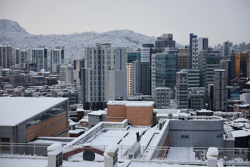 A snow-covered neighbourhood in Seoul last month. The scourge of loneliness manifests in different ways across the sprawling metropolis. Photo: Reuters A snow-covered neighbourhood in Seoul last month. The scourge of loneliness manifests in different ways across the sprawling metropolis. Photo: Reuters