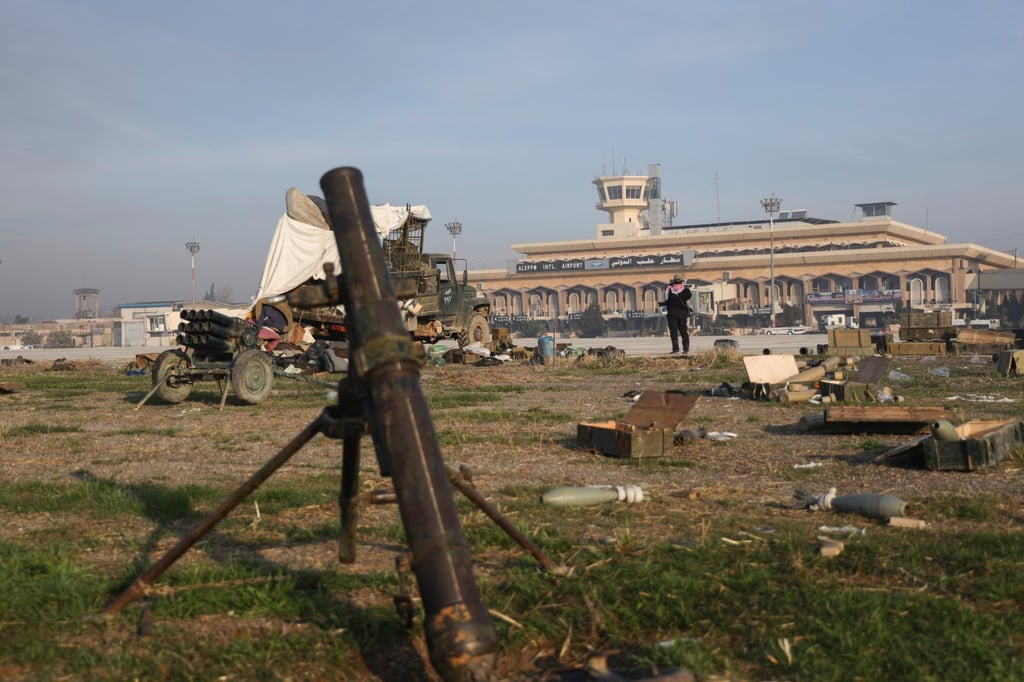 Opposition fighters in control of Aleppo airport on Monday. Photo: AP