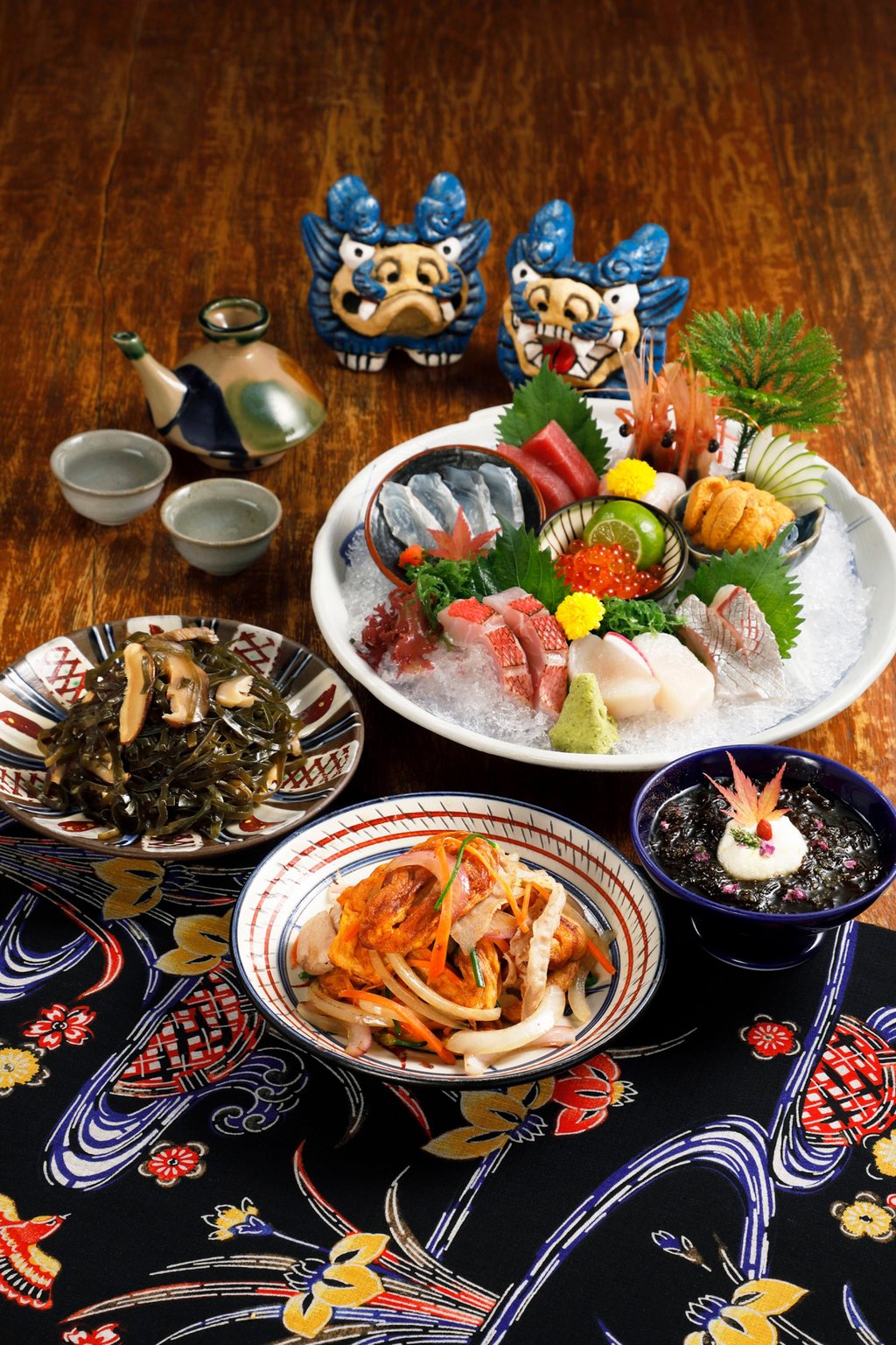Dishes at Rakuen, a homestyle Okinawan izakaya in Hong Kong. Photo: Handout