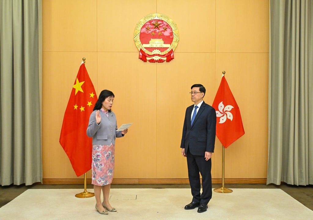 Mable Chan takes the oath of office on Thursday, witnessed by Chief Executive John Lee. Photo: ISD Mable Chan takes the oath of office on Thursday, witnessed by Chief Executive John Lee. Photo: ISD