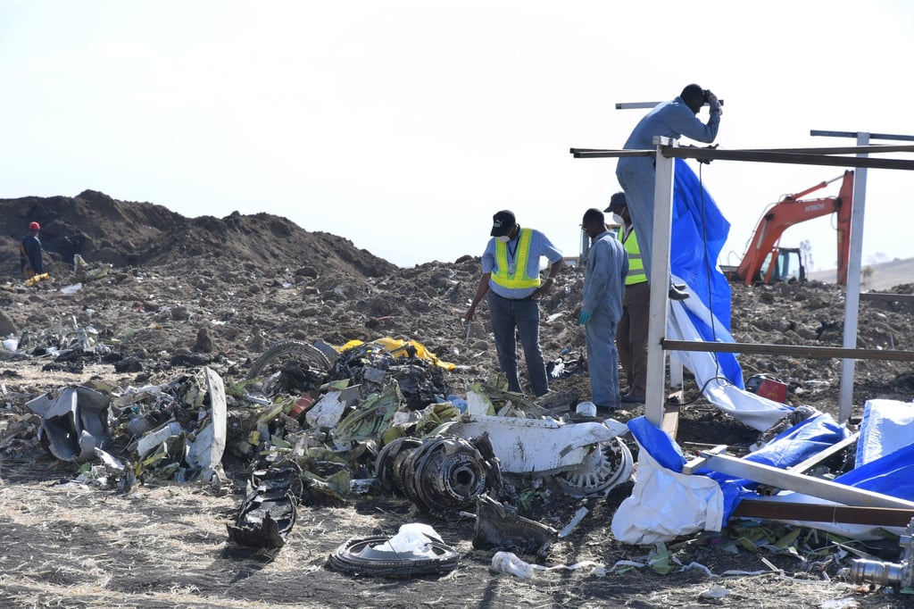 Rescuers search the site for pieces of the wreckage of an Ethiopia Airlines Boeing 737 Max 8 aircraft near Bishoftu, Ethiopia on March 13, 2019. Photo: EPA-EFE Rescuers search the site for pieces of the wreckage of an Ethiopia Airlines Boeing 737 Max 8 aircraft near Bishoftu, Ethiopia on March 13, 2019. Photo: EPA-EFE