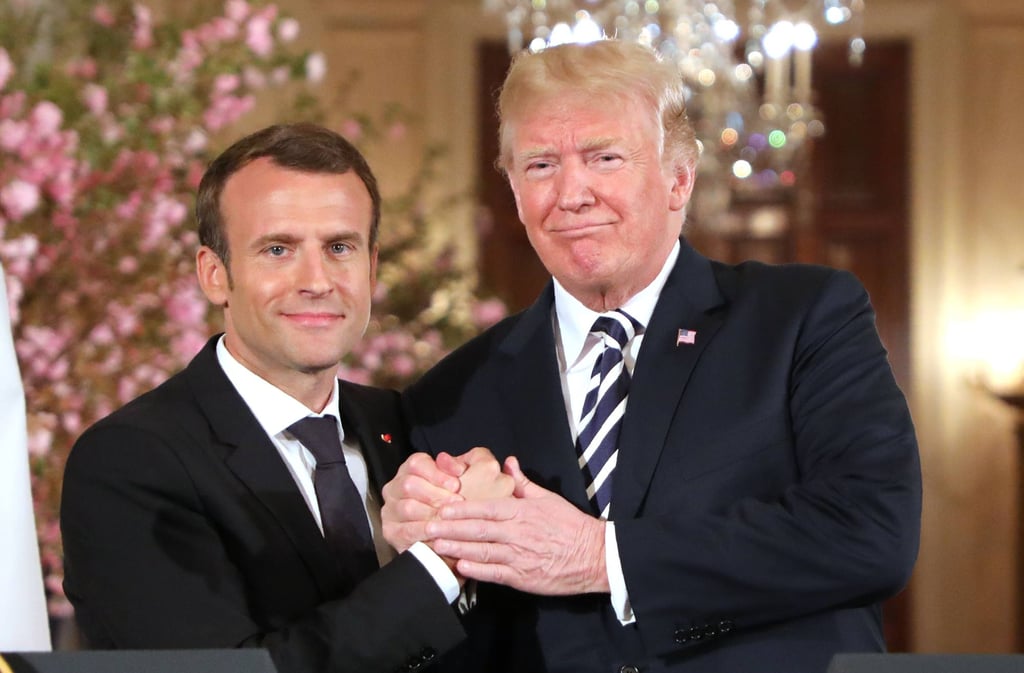 US President Donald Trump and French President Emmanuel Macron shake hands during a joint press conference at the White House in April 2018. Photo: AFP US President Donald Trump and French President Emmanuel Macron shake hands during a joint press conference at the White House in April 2018. Photo: AFP