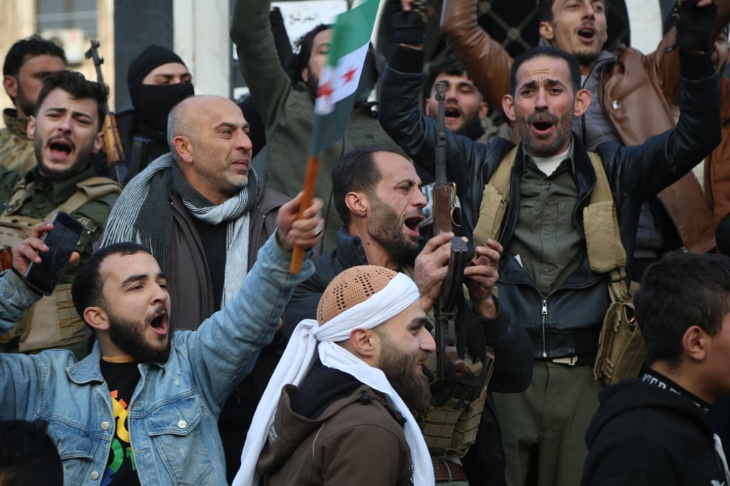 Syrian rebels celebrate in Homs, Syria following the takeover of Damascus on Sunday. Photo: EPA-EFE Syrian rebels celebrate in Homs, Syria following the takeover of Damascus on Sunday. Photo: EPA-EFE