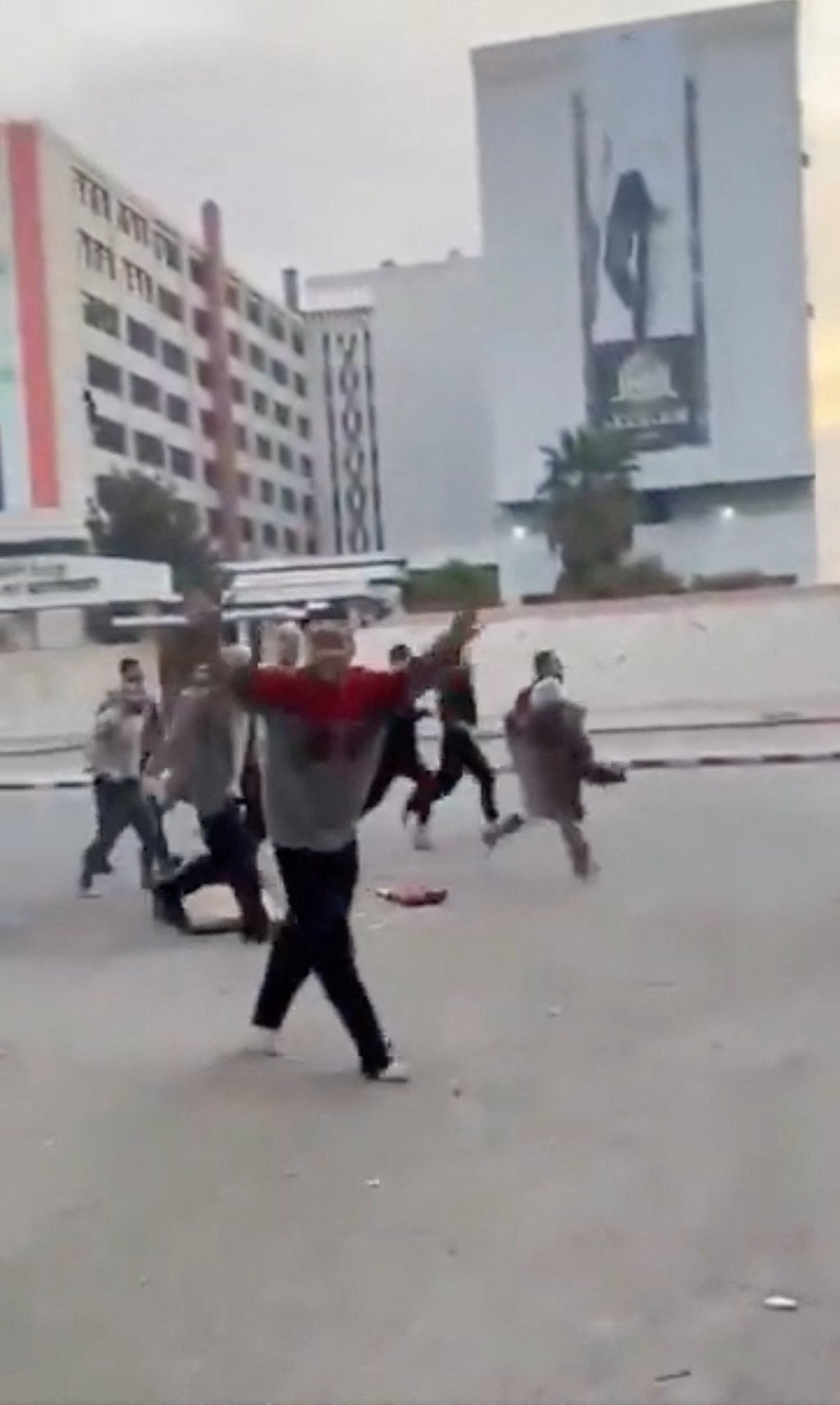 Individuals, reportedly freed prisoners, in the streets of Damascus. Photo: Nedal Al-Amari via Reuters Individuals, reportedly freed prisoners, in the streets of Damascus. Photo: Nedal Al-Amari via Reuters