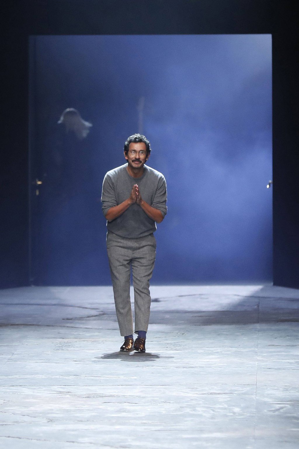 Haider Ackermann acknowledges the public at the end of the Berluti show during men’s fashion week for the fall/winter 2017-18 collection in Paris. Photo: AFP Haider Ackermann acknowledges the public at the end of the Berluti show during men’s fashion week for the fall/winter 2017-18 collection in Paris. Photo: AFP