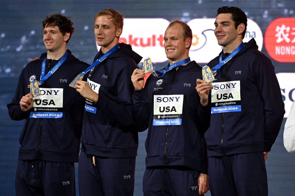 Team gold (from left): Chris Guiliano, Kieran Smith, Luke Hobson and Jack Alexy celebrate after the men’s 4x100m freestyle final. Photo: EPA-EFE Team gold (from left): Chris Guiliano, Kieran Smith, Luke Hobson and Jack Alexy celebrate after the men’s 4x100m freestyle final. Photo: EPA-EFE