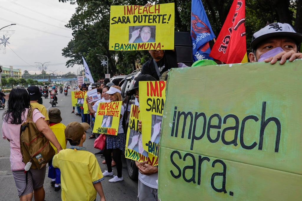 Protesters hold a rally in Quezon City calling for Duterte-Carpio’s impeachment on December 4. Photo: EPA-EFE