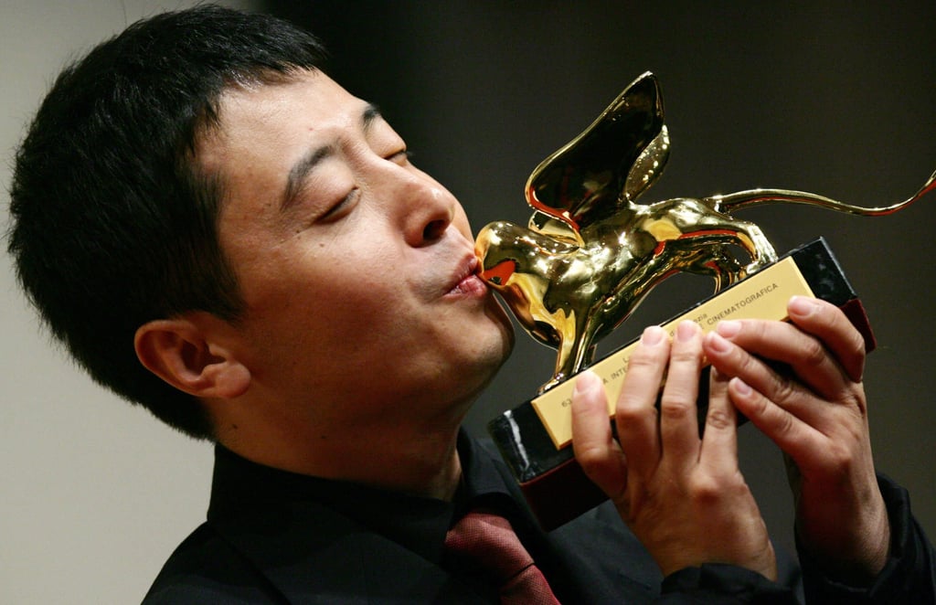 Jia Zhangke poses with the Golden Lion for best film for still life at the Venice International film Festival in 2006. Photo: AFP Jia Zhangke poses with the Golden Lion for best film for still life at the Venice International film Festival in 2006. Photo: AFP