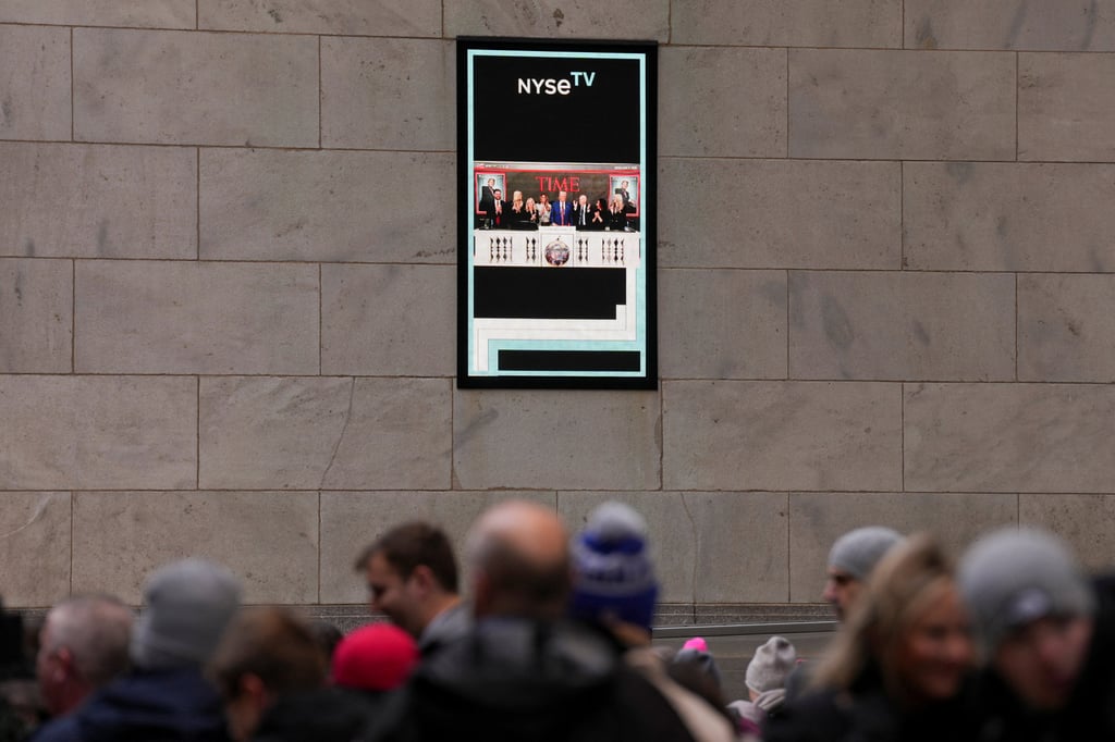 A screen displays an image featuring Donald Trump on the wall of the New York Stock Exchange. Photo: Reuters A screen displays an image featuring Donald Trump on the wall of the New York Stock Exchange. Photo: Reuters
