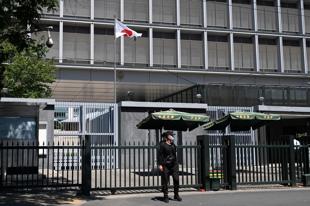 Police and security personnel stand outside the entrance of the Japanese embassy in Beijing. Photo: AFP Police and security personnel stand outside the entrance of the Japanese embassy in Beijing. Photo: AFP