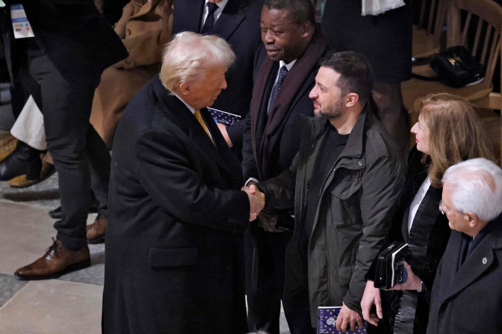 US president-elect Donald Trump shakes hands with Ukraine’s President Volodymyr Zelensky inside Notre Dame cathedral in Paris on December 7. Photo: AFP US president-elect Donald Trump shakes hands with Ukraine’s President Volodymyr Zelensky inside Notre Dame cathedral in Paris on December 7. Photo: AFP