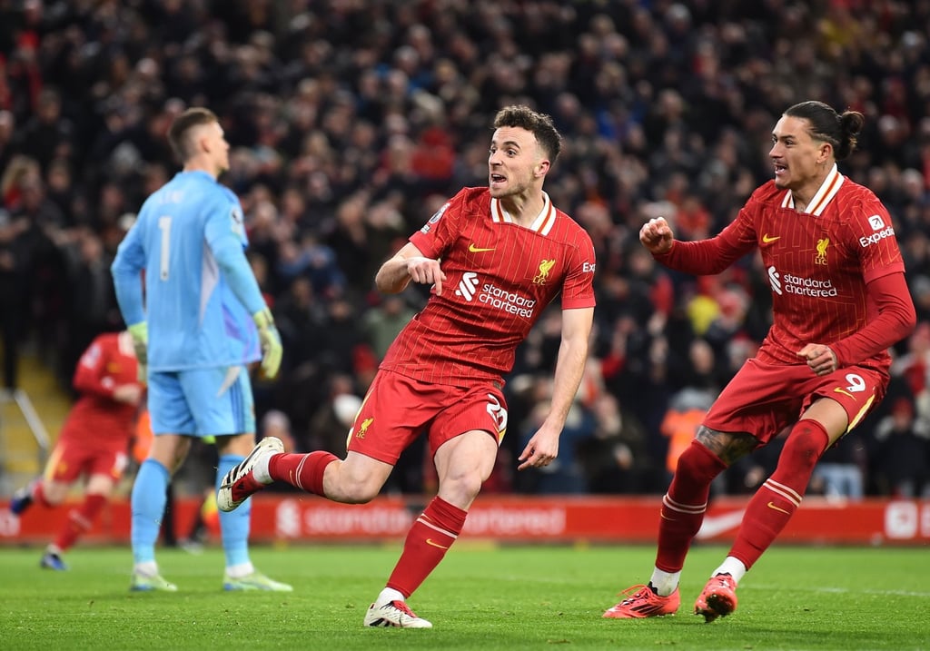 Liverpool forward Diogo Jota, left, celebrates with Darwin Nunez after his late leveller against Fulham. Photo: EPA Liverpool forward Diogo Jota, left, celebrates with Darwin Nunez after his late leveller against Fulham. Photo: EPA