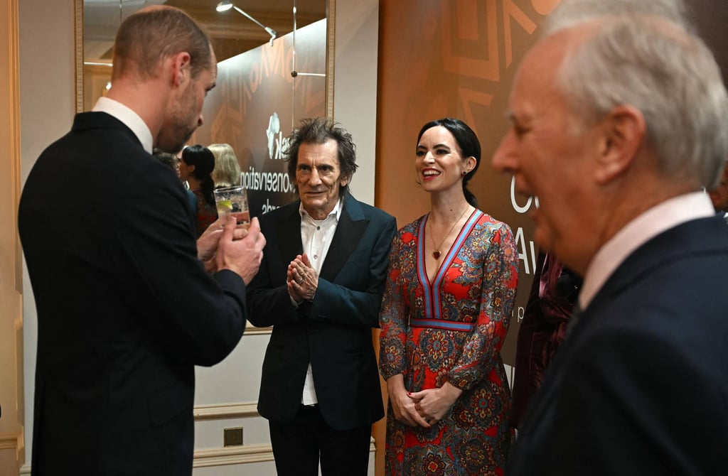 Prince William with Ronnie Wood and Sally Humphreys in November. Photo: AFP