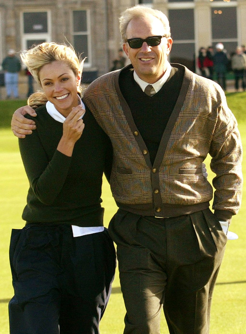 Kevin Costner with then-wife Christine Baumgartner at St Andrews Golf Club in Fife, Scotland, in 2004. Photo: Reuters