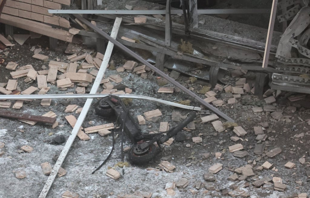 A destroyed scooter at the scene. Photo: EPA-EFE