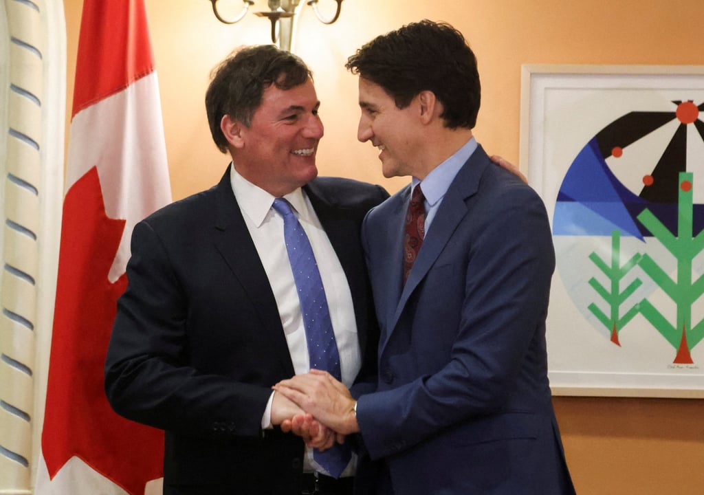 Canada’s Prime Minister Justin Trudeau with Dominic LeBlanc after being sworn in as finance minister. Photo: Reuters