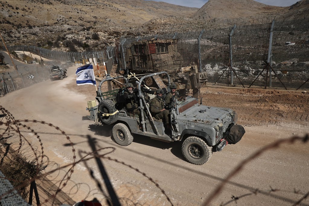 Israeli troops on their way out of the Syrian side of the border. Photo: EPA-EFE