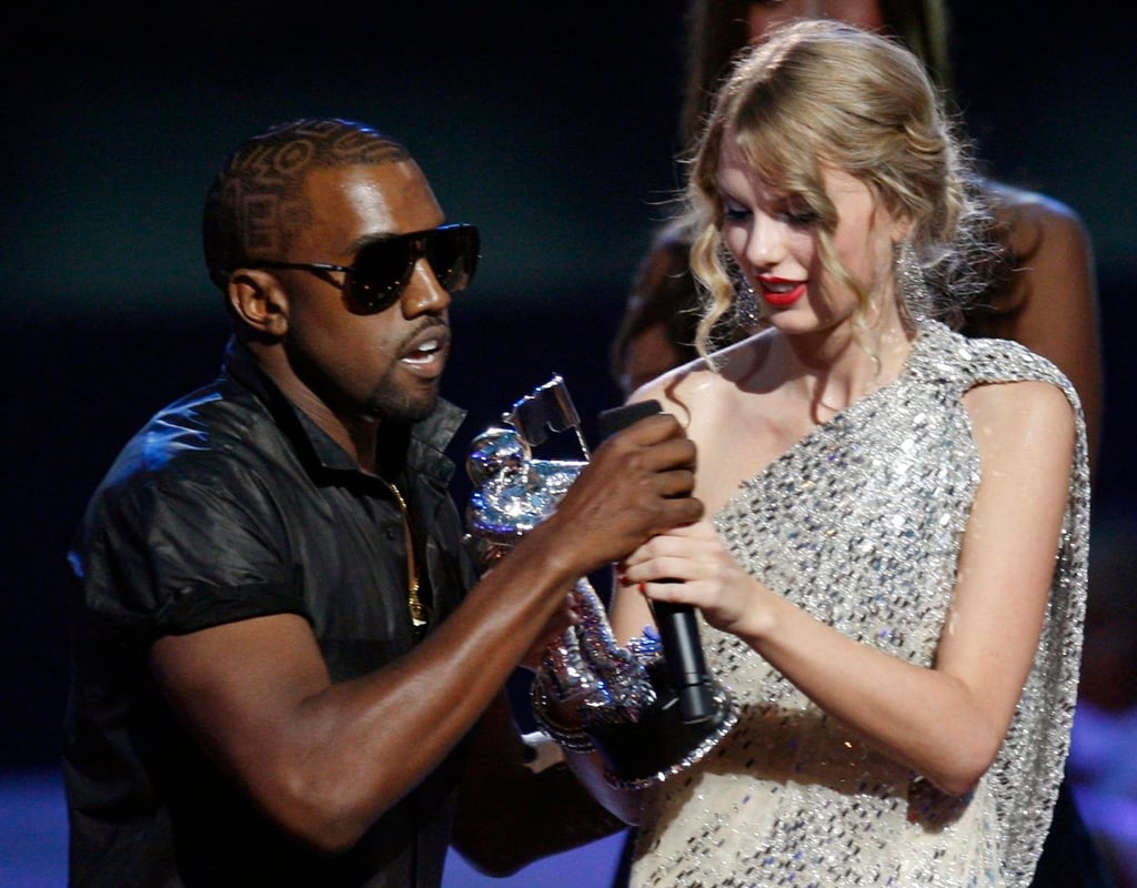 Kanye West snatches the microphone from Best Female Video Award winner Taylor Swift at the 2009 MTV Video Music Awards. Photo: Reuters Kanye West snatches the microphone from Best Female Video Award winner Taylor Swift at the 2009 MTV Video Music Awards. Photo: Reuters