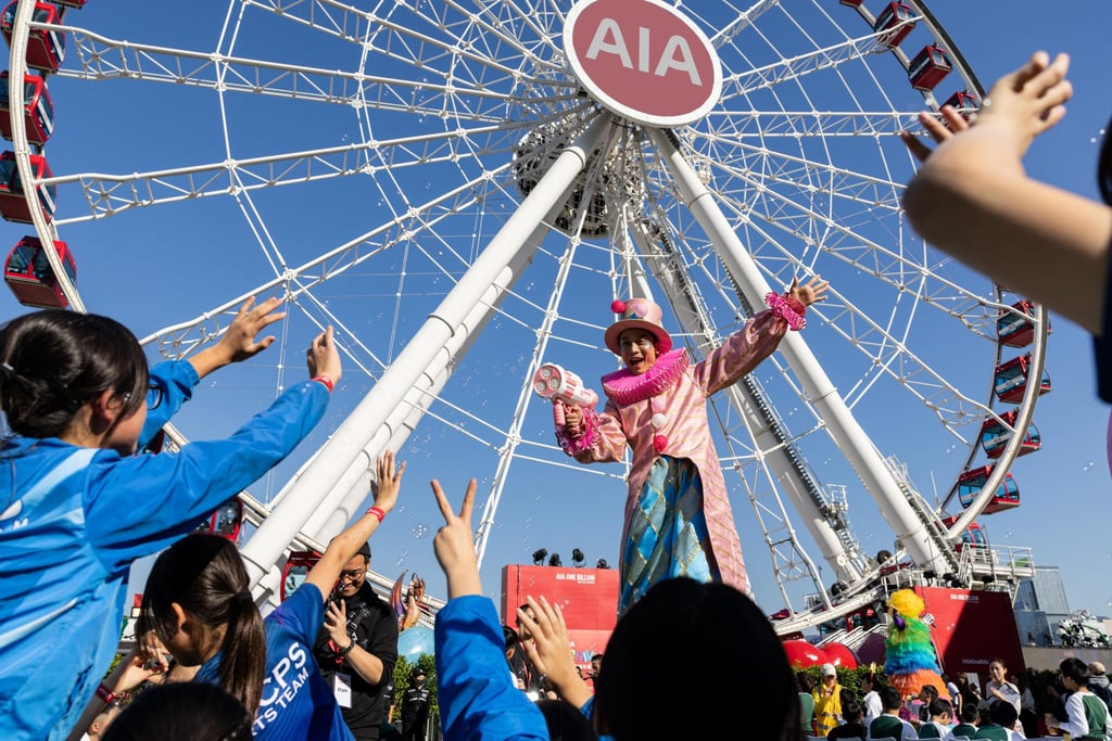 Representatives from NGOs and students from AIA Healthiest Schools and scholarship programmes attend the community celebration. Representatives from NGOs and students from AIA Healthiest Schools and scholarship programmes attend the community celebration.