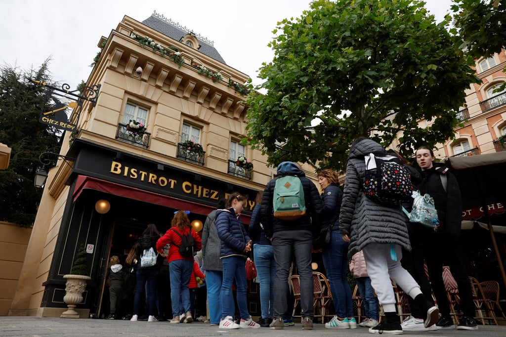 Visitors queue to enter Bistrot Chez Remy in Disneyland Paris. Photo: AFP Visitors queue to enter Bistrot Chez Remy in Disneyland Paris. Photo: AFP