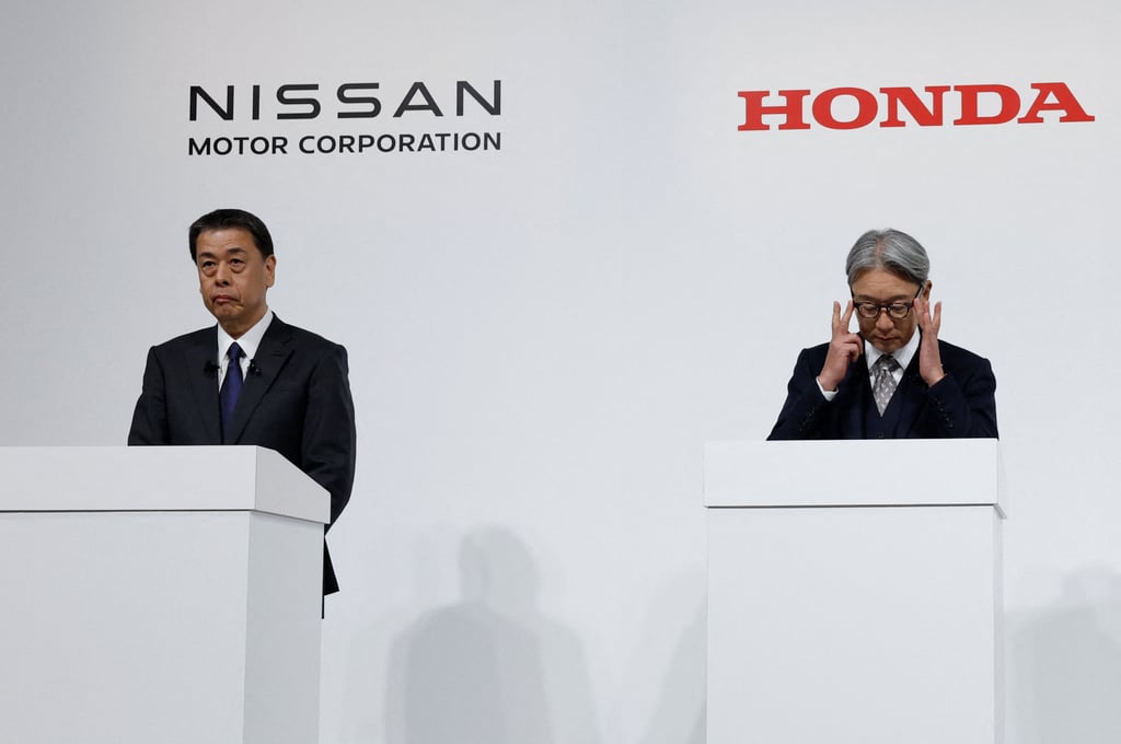 Makoto Uchida, Director, Representative Executive Officer, President and CEO of Nissan Motor Corporation and Toshihiro Mibe, Director, President and Representative Executive Officer of Honda, hold a joint press conference in Tokyo, Japan on December 23. Photo: Reuters