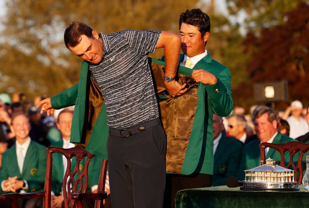 Hideki Matsuyama (right) helps Scottie Scheffler put on the Green Jacket at the 2022 Masters. Photo: EPA-EFE Hideki Matsuyama (right) helps Scottie Scheffler put on the Green Jacket at the 2022 Masters. Photo: EPA-EFE