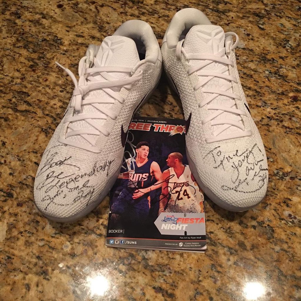 Sneakers autographed by Kobe Bryant and dedicated to Devin Booker, as shared by Booker on his Instagram in March 2016. Photo: @dbook/Instagram