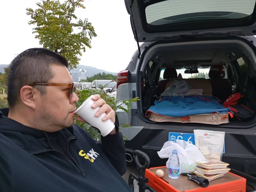 Garrick Tang on a camping trip using his SUV, which he bought on the mainland. Photo: Garrick Tang Garrick Tang on a camping trip using his SUV, which he bought on the mainland. Photo: Garrick Tang
