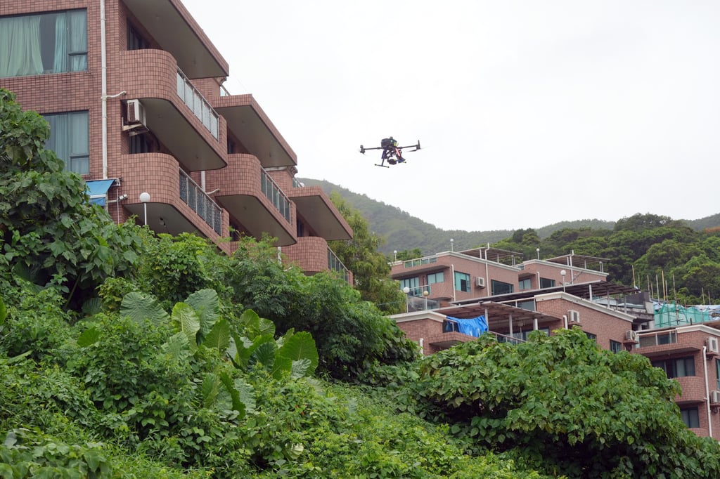 Hong Kong police demonstrate using drones to help catch burglars hiding in the countryside, in Sai Kung. Photo: May Tse