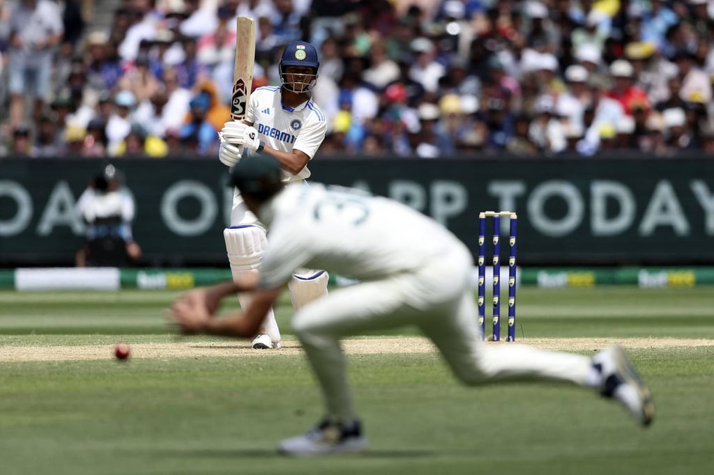 India’s Yashasvi Jaiswal bats directly to Australia’s Pat Cummins before trudging off. Photo: AFP- India’s Yashasvi Jaiswal bats directly to Australia’s Pat Cummins before trudging off. Photo: AFP-