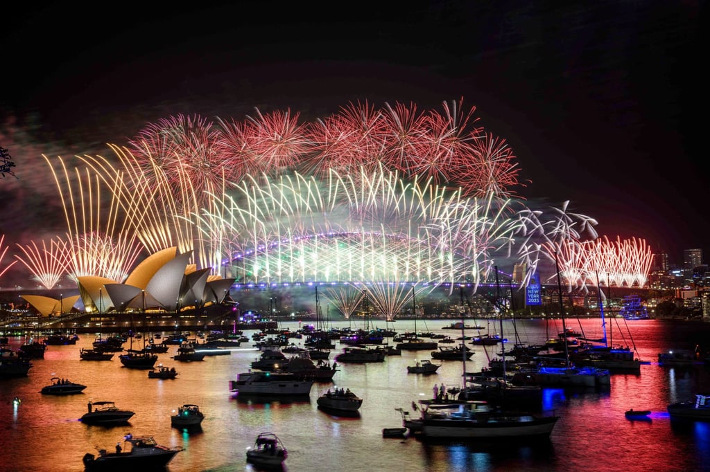 Fireworks explode over the Sydney Opera House and Harbour Bridge. Photo: AAP Image via Reuters Fireworks explode over the Sydney Opera House and Harbour Bridge. Photo: AAP Image via Reuters