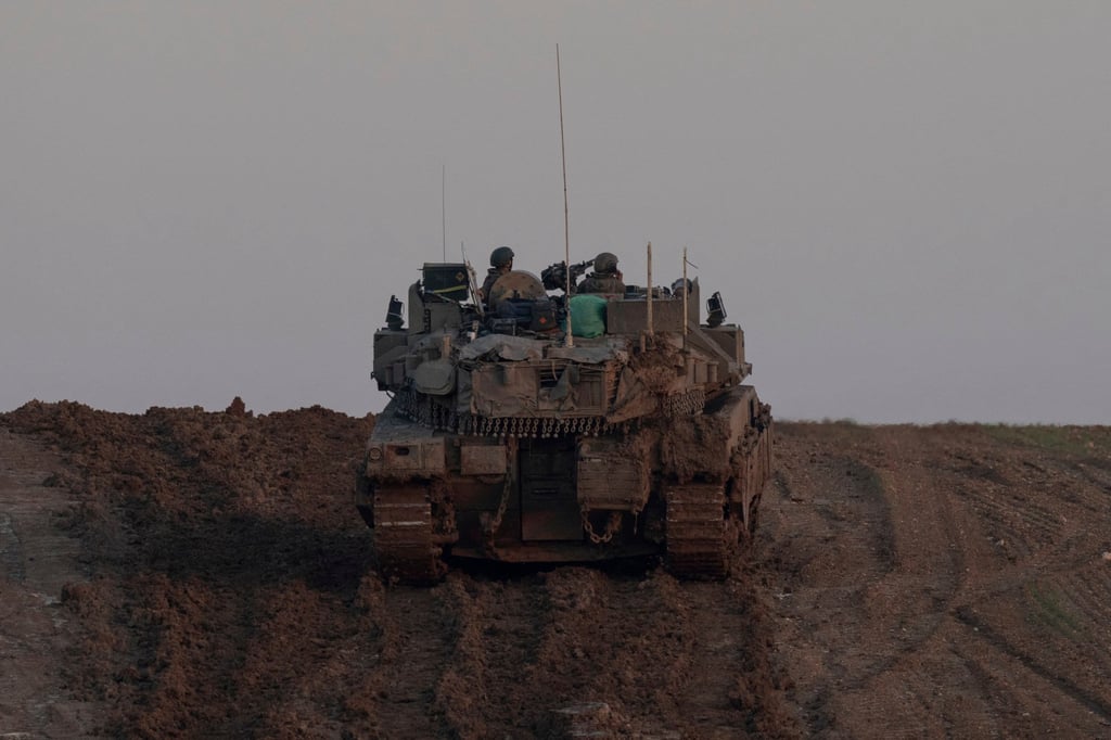 An Israeli tank near the Israeli-Gaza border. Phot: AP An Israeli tank near the Israeli-Gaza border. Phot: AP