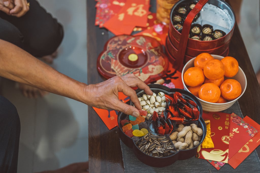 Modern chuen hup tend to contain other treats to cater to people’s preferences, including nuts and wrapped confectionery. Photo: Getty Images Modern chuen hup tend to contain other treats to cater to people’s preferences, including nuts and wrapped confectionery. Photo: Getty Images