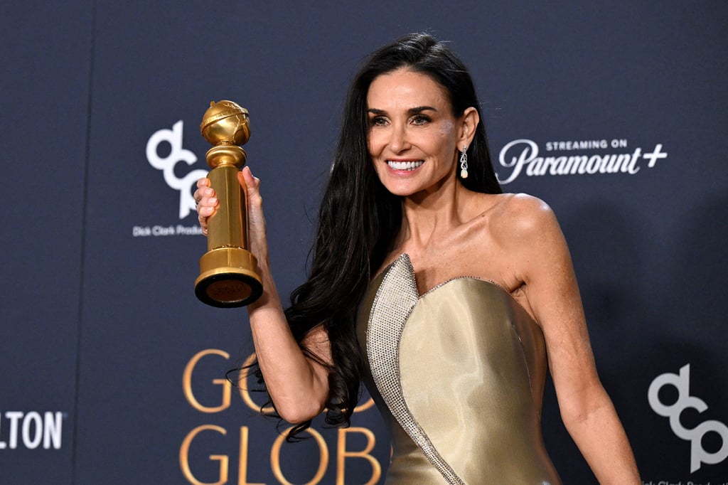 US actress Demi Moore with her Golden Globe award. Photo: Getty Images US actress Demi Moore with her Golden Globe award. Photo: Getty Images