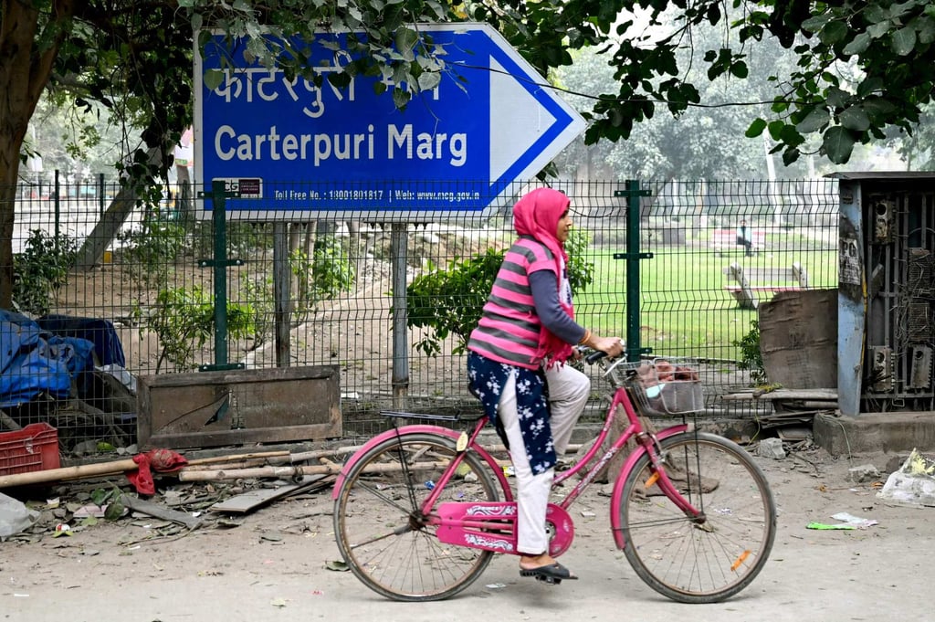 A cyclist rides past a sign, near Carterpuri village, or the “village of Carter”, which was renamed from Daulatpur Nasirabad after an hour-long visit by the Nobel laureate in 1978. Photo: AFP A cyclist rides past a sign, near Carterpuri village, or the “village of Carter”, which was renamed from Daulatpur Nasirabad after an hour-long visit by the Nobel laureate in 1978. Photo: AFP