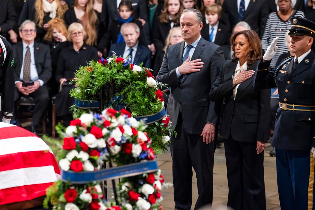 US Vice-President Kamala Harris and first gentleman Doug Emhoff pay their respects at the casket of former US president Jimmy Carter in the Rotunda of the US Capitol on Tuesday. Photo: EPA-EFE US Vice-President Kamala Harris and first gentleman Doug Emhoff pay their respects at the casket of former US president Jimmy Carter in the Rotunda of the US Capitol on Tuesday. Photo: EPA-EFE