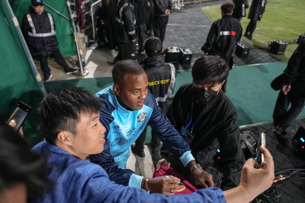 Patrick Kluivert meets fans at last month’s Barcelona v Real Madrid legends match in Hong Kong. Photo: EPA-EFE Patrick Kluivert meets fans at last month’s Barcelona v Real Madrid legends match in Hong Kong. Photo: EPA-EFE
