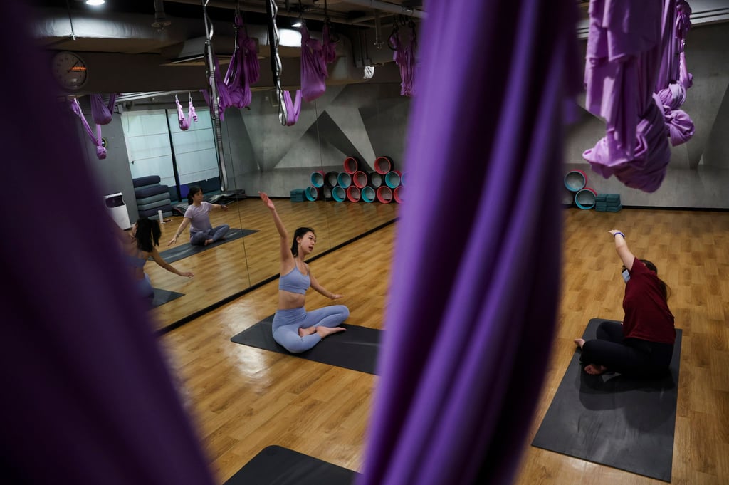 A yoga session at a gym in Tsim Sha Tsui, Hong Kong, in 2022. Photo: Yik Yeung-man A yoga session at a gym in Tsim Sha Tsui, Hong Kong, in 2022. Photo: Yik Yeung-man