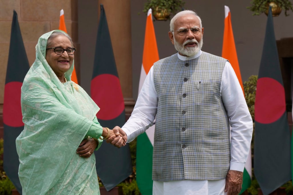 Indian Prime Minister Narendra Modi (right) shakes hand with his Bangladeshi counterpart Sheikh Hasina in New Delhi last year, before her ousting. Photo: AP Indian Prime Minister Narendra Modi (right) shakes hand with his Bangladeshi counterpart Sheikh Hasina in New Delhi last year, before her ousting. Photo: AP