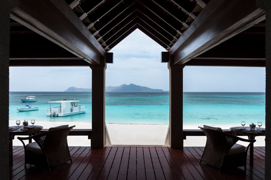 Enjoy views of surrounding islands while enjoying dinner at the Beach Club, Amanpulo. Photo: Handout Enjoy views of surrounding islands while enjoying dinner at the Beach Club, Amanpulo. Photo: Handout