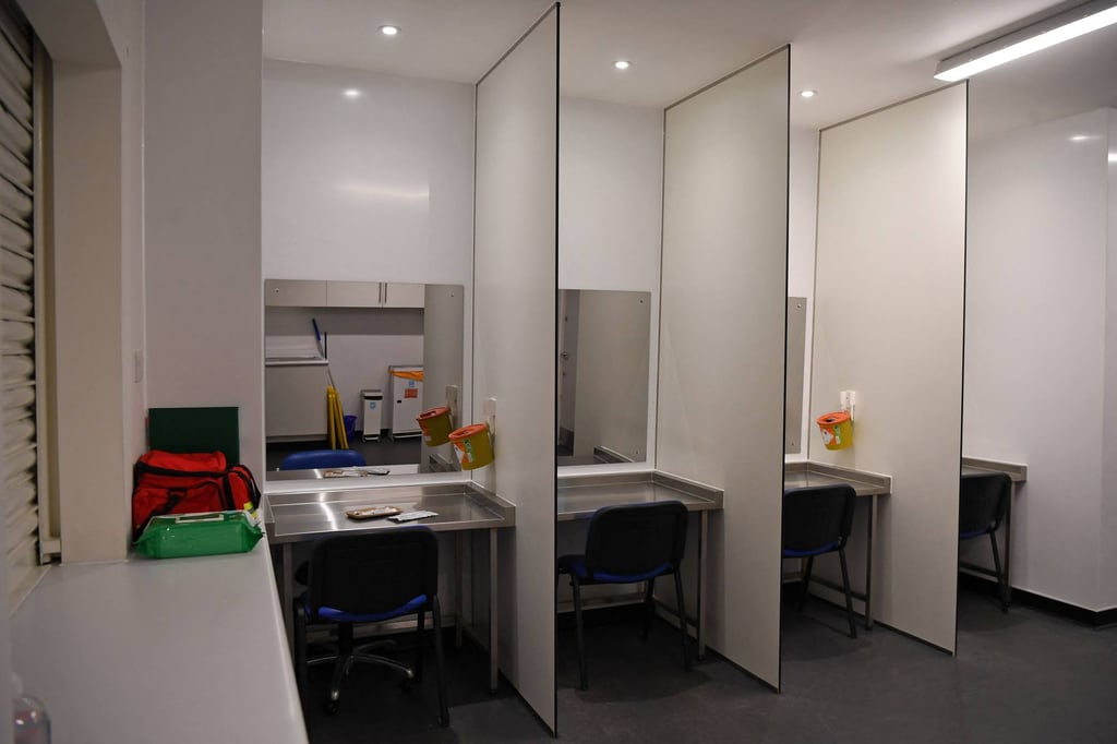 Cubicles inside the UK’s first consumption room for illegal drugs. Photo: AFP Cubicles inside the UK’s first consumption room for illegal drugs. Photo: AFP